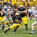 Senior quarterback Denard Robinson makes a move against Air Force defense at Michigan Stadium. Daniel Brenner I AnnArbor.com